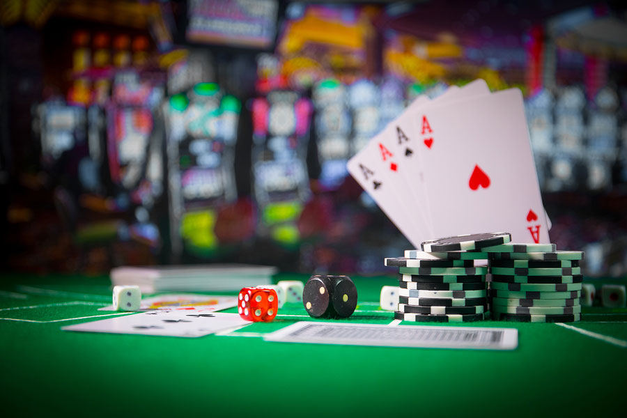 Casino Cards and chips on green felt casino table
